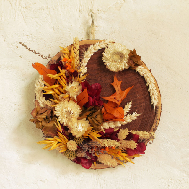 CL397- Rodaja de madera. flores secas. 20cm 