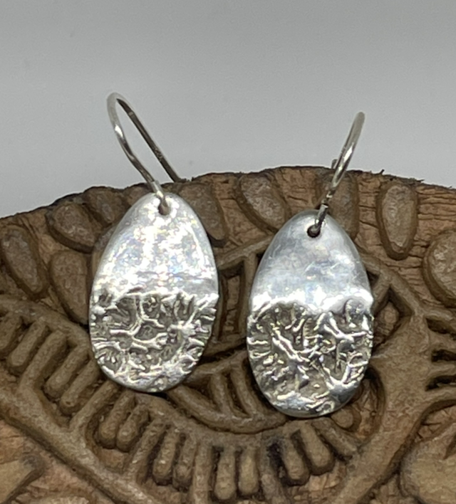 Oval 1/2 textured silver earrings