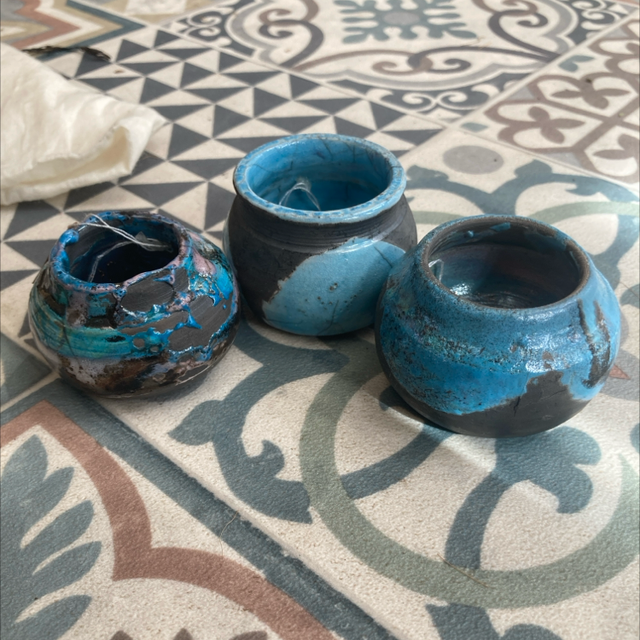 Small clay raku fired pot