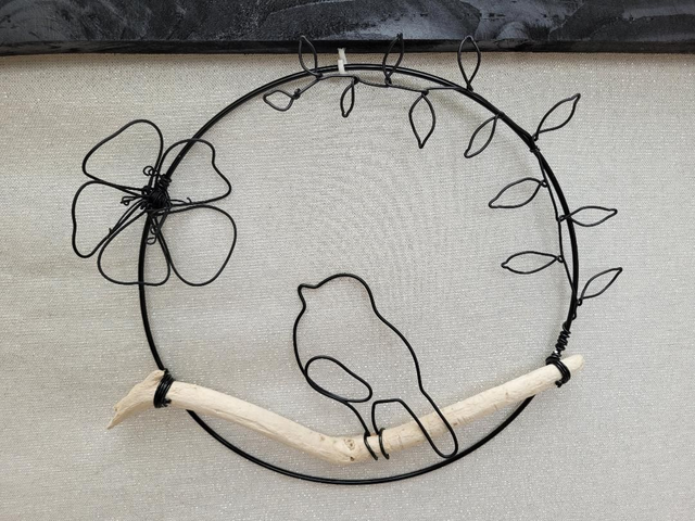 C30 - 1 oiseau dans cercle métal 