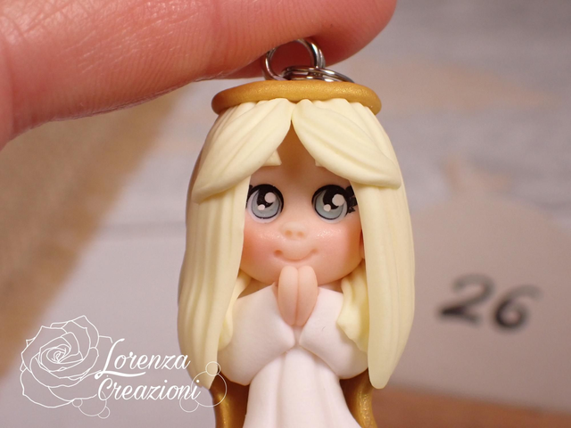 Angioletto custode tascabile n. 26
Portachiavi o charm, artigianale, pezzo unico. Modellato a mano argilla polimerica, made in Italy.
