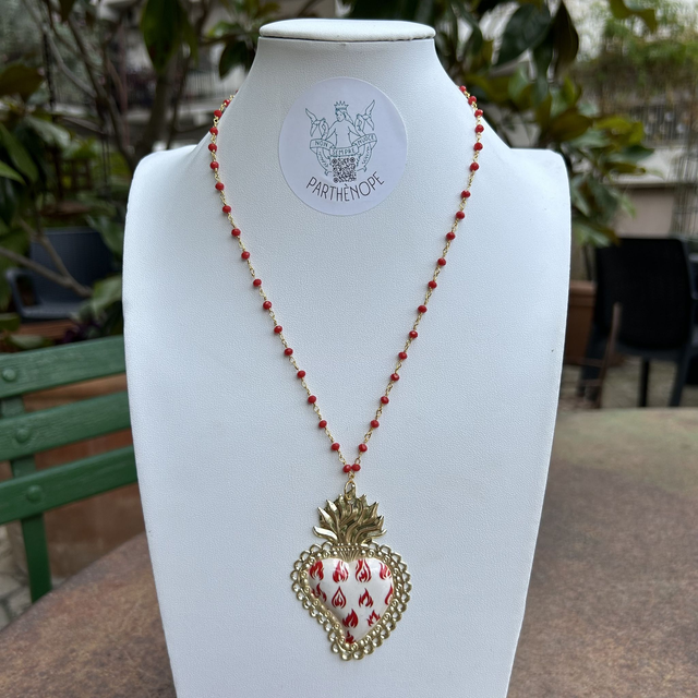 Cuore ex-voto con fiamme