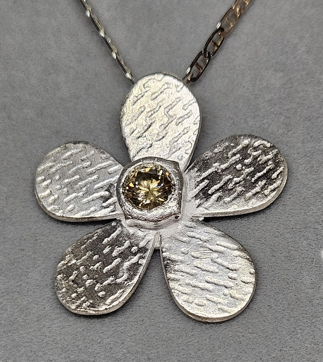 Flower (rounded petals) pendant with champagne cubic zirconia
