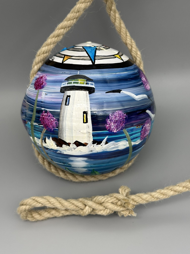 Lighthouse with sea pinks