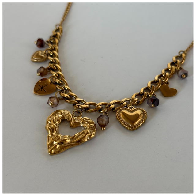 Collier épais multi pampilles coeur