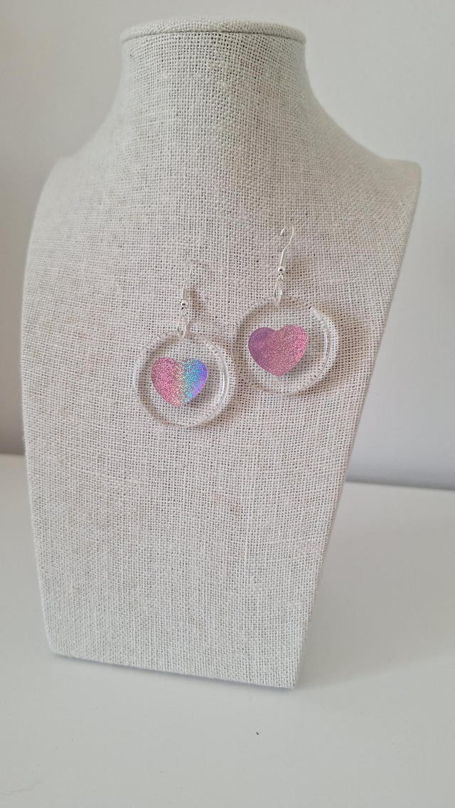 Boucles oreilles transparentes cœur rose/argenté 