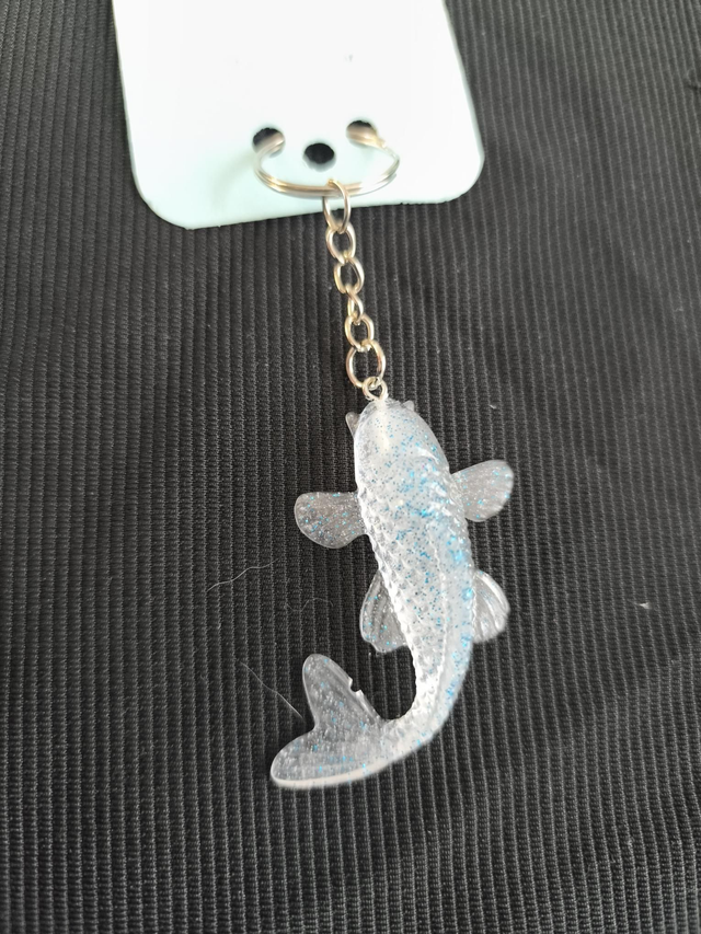 Porte-clé pailleté blanc bleu