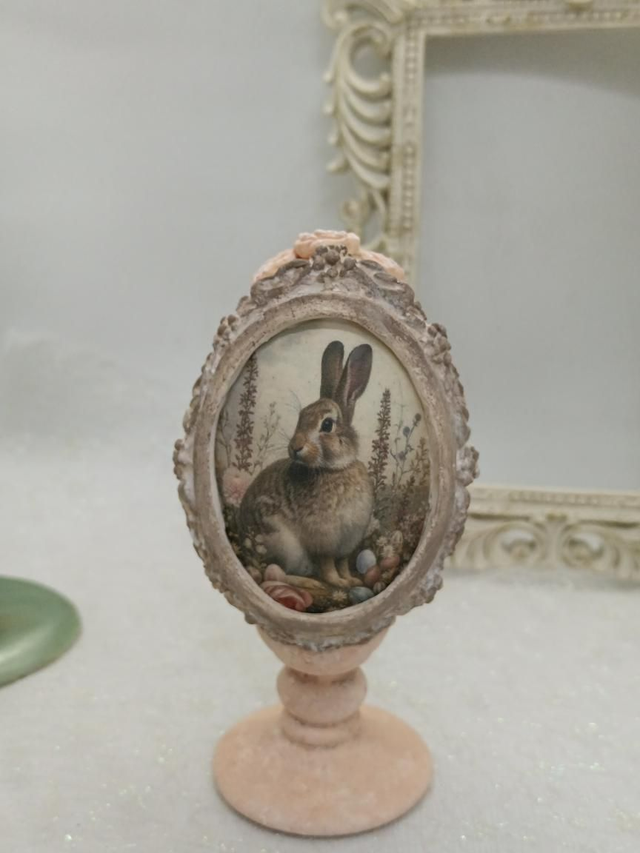 Peach Goose egg with a rabbit print 