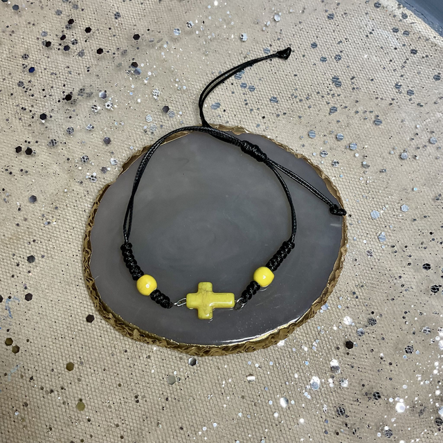 Adjustable bracelet with quartz cross. Fully adjustable cord bracelet.