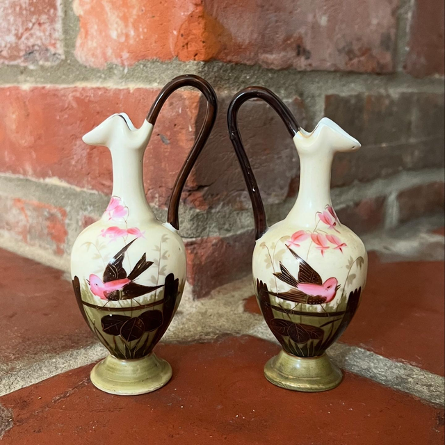 Pair Of Antique Continental Porcelain Ewers Adorned With Flowers And Birds 