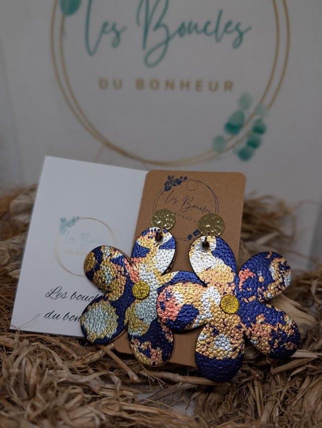 Boucles d'oreilles marguerite marine dorée m660