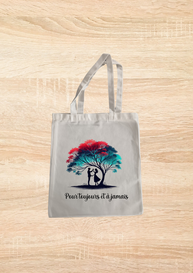 Sac fourre tout motif couple sous un arbre coloré  