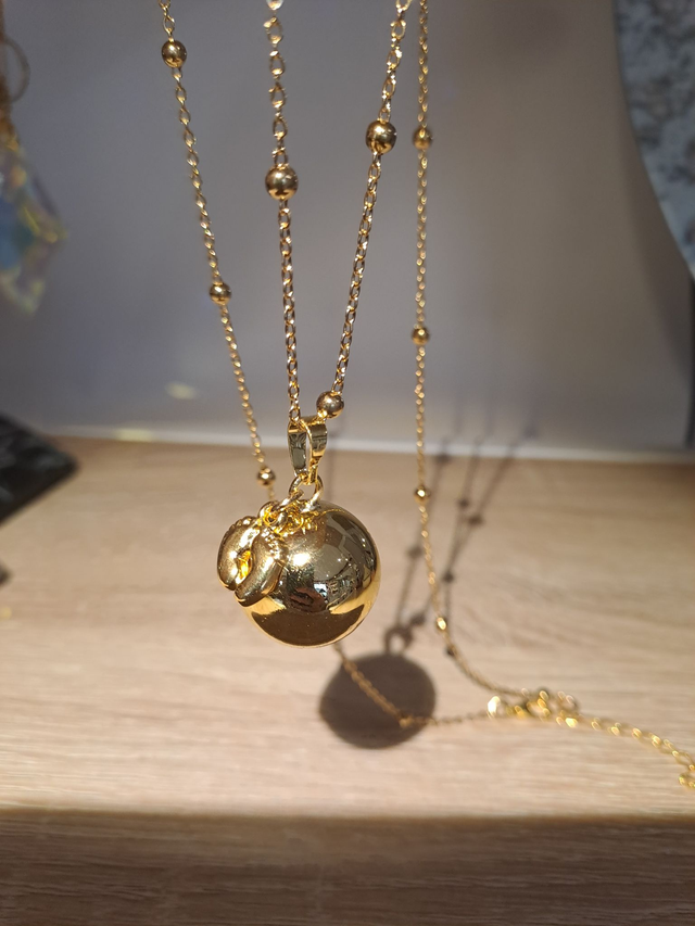 Bola de grossesse acier inoxydable pied bébé doré