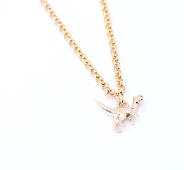 Trendiger Eyecatcher mit verspieltem Detail „Dino“