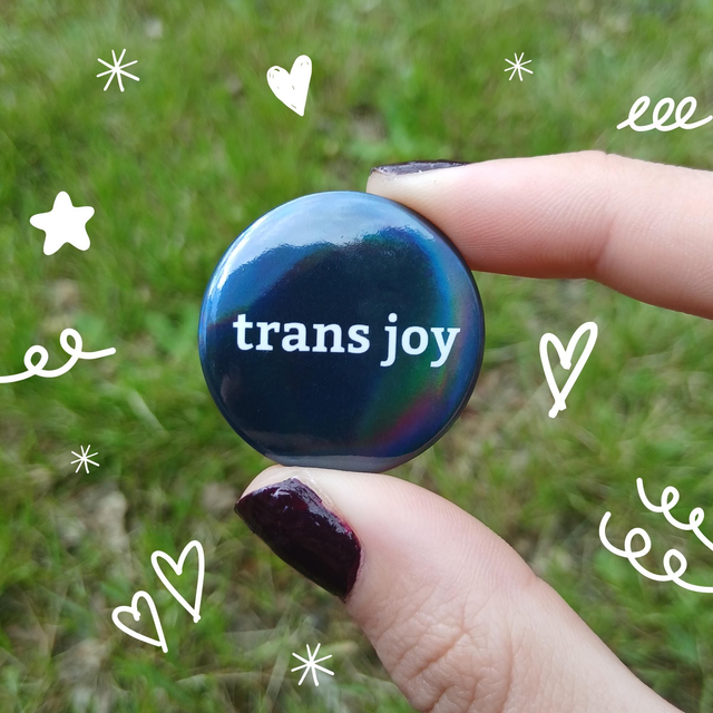 Trans Joy Button Badge With Holographic Oil Spill Finish