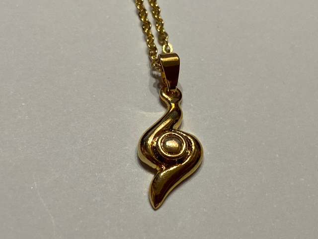 Gold tone swirl necklace