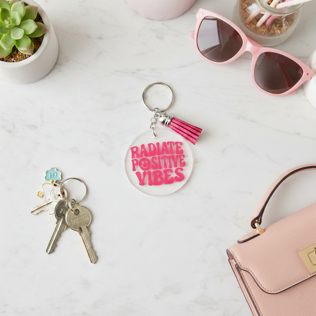 Porte clés rond Radiate Positive Vibes