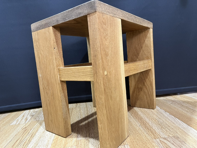 Oak cantilever stool made of solid oak wood in two colors.