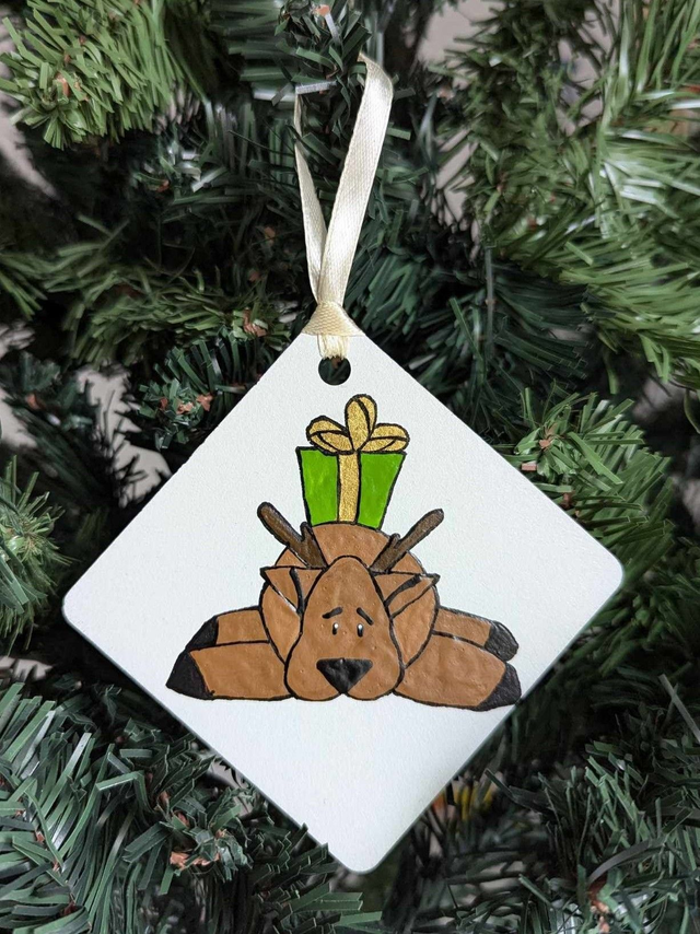 Cerf et son cadeau 2024