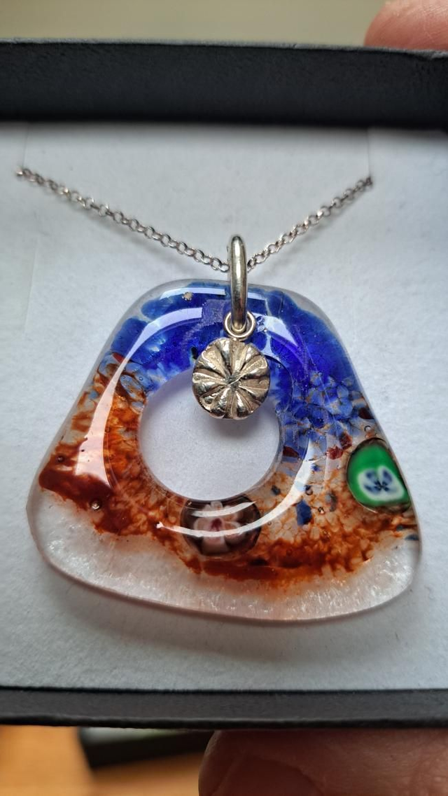 Abstract fused glass with silver poppy head 
