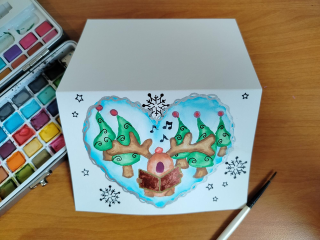 Carte de voeux '' cœur de Noël '' renne chantant 