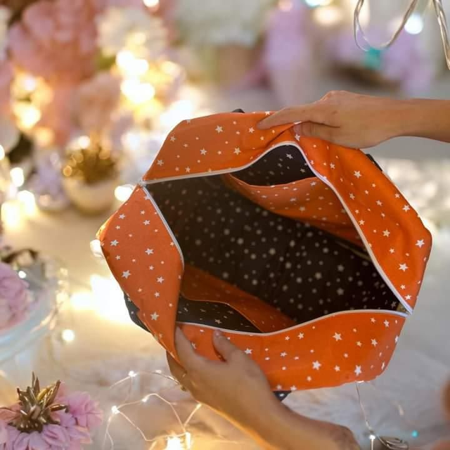 Sac à langer étoiles orange