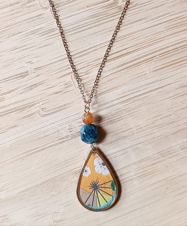 Collier goûte orangé avec perles