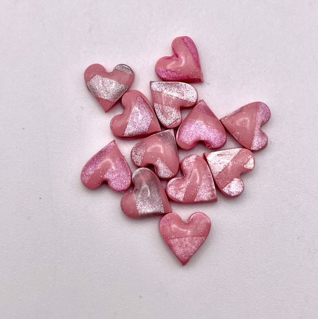 Pink mini heart studs 