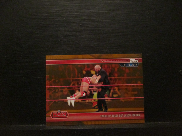Triple H Takes Out Jason Jordan - Brown Champions Original Trading Card #11