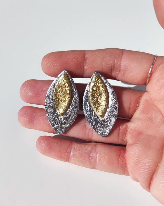 Candela plateado y dorado brillante