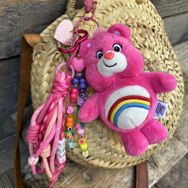 Grigri de sac Bisounours Rose Arc-en-ciel