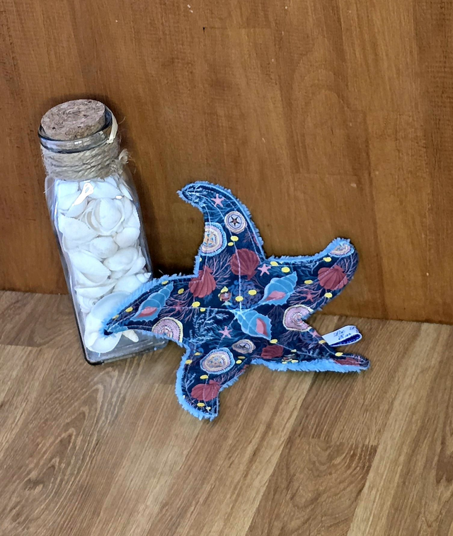 doudou plat étoile de mer 