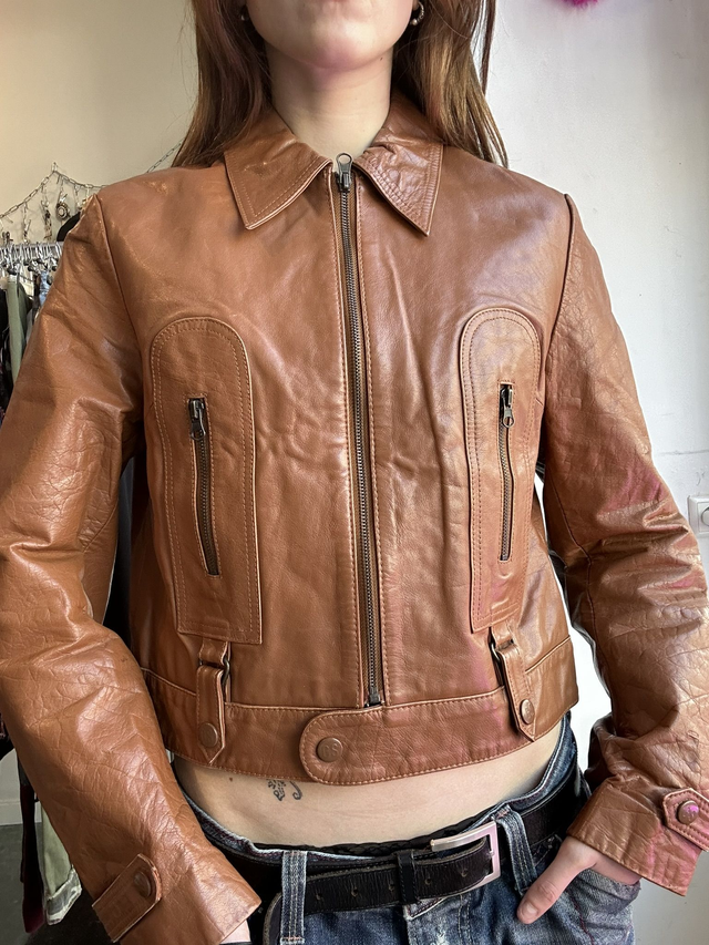 cognac brown leather jacket with front zipper pockets