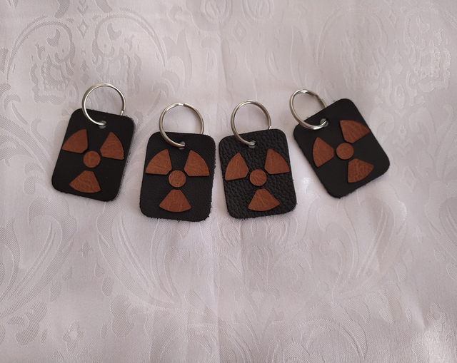 Porte clé pièce en cuir noir rectangulaire