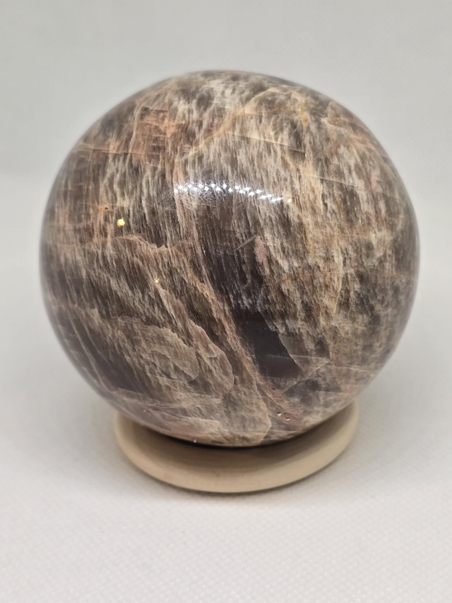 Pierre de lune brune orangée forme sphère 