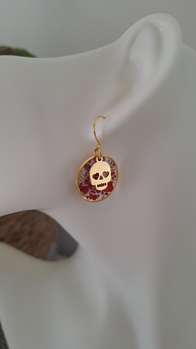 Boucles d&#039;oreilles crâne Halloween doré et paillettes rouges