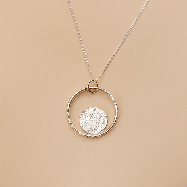 Sterling silver hammered ring with hammered disc necklace