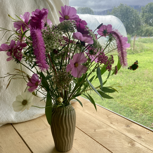 Chic earthenware vase filled with lovingly arranged Fresh Kerry Flowers