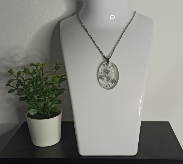 Pendentif éclat d&#039;argenté CO012