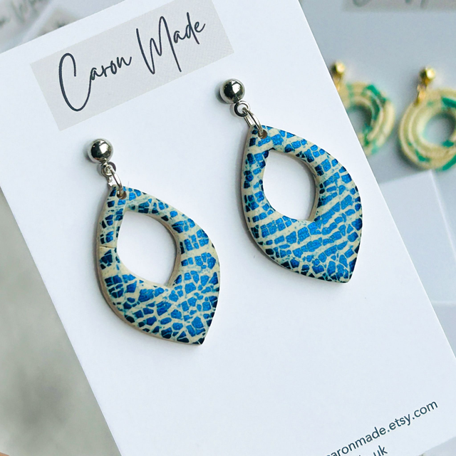 Blue shiny petal shape earrings with stainless steel stud