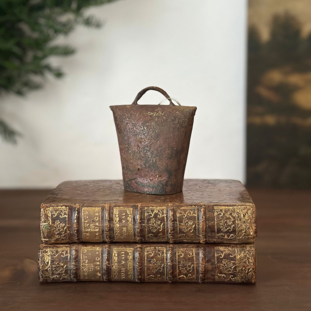 la cloche brute en métal