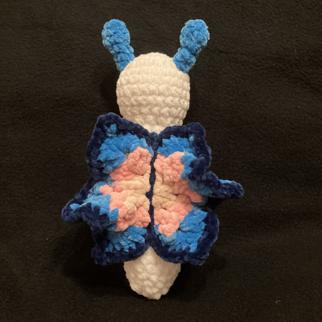 Papillon fleur blanc/bleu/rose