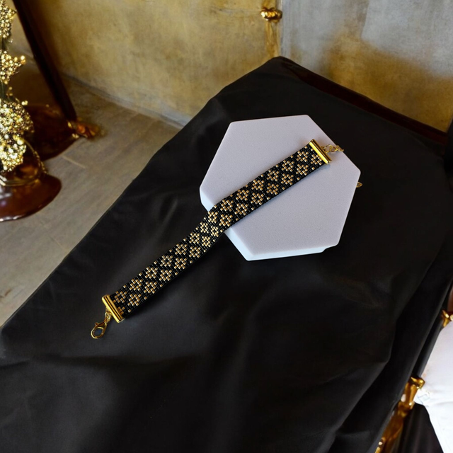 Bracelet élégant noir et or