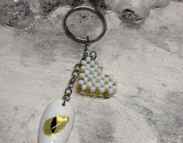 Porte-clé œil dragon blanc 