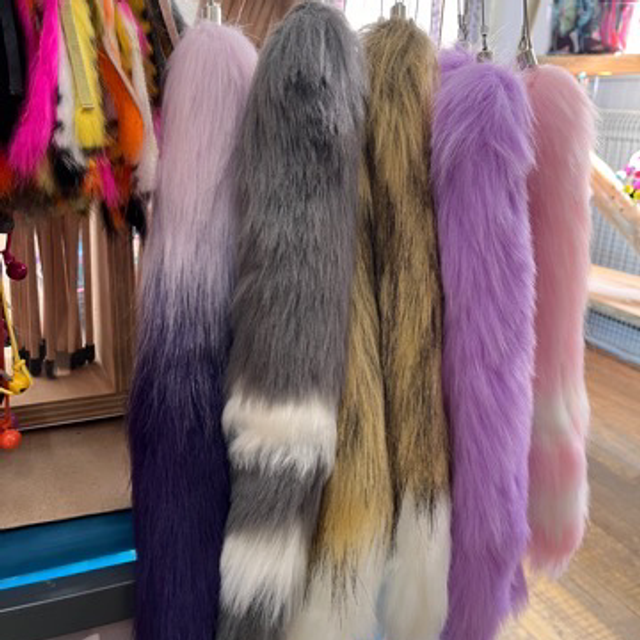 Tail on a long stick