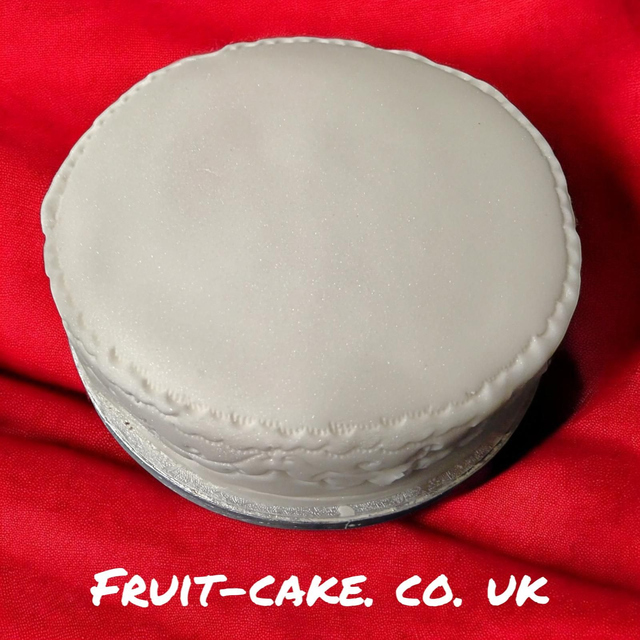 Plain Fondant Iced Orchard Fruitcake with Red Ribbon