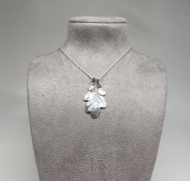 Oak leaf pendant on silver necklace