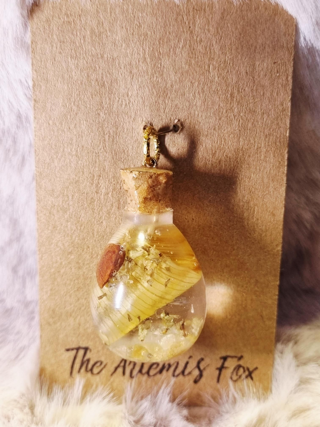 Le Pendentif Potion #55 - Joie