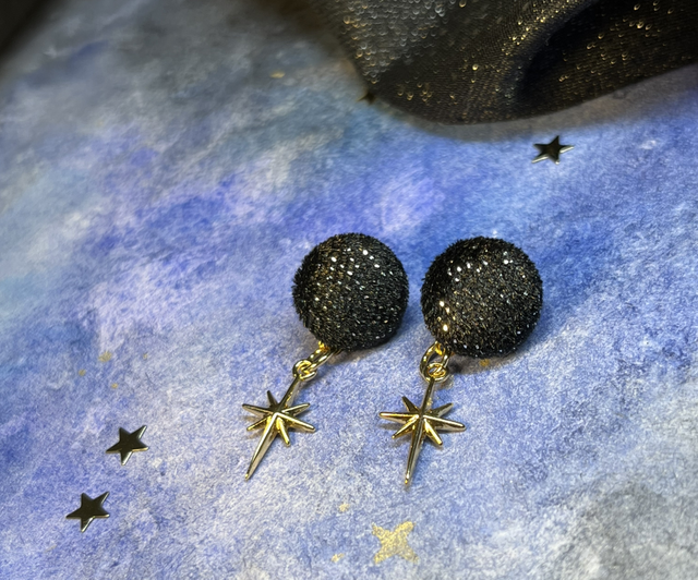 Babys noir pailleté et son étoile dorée