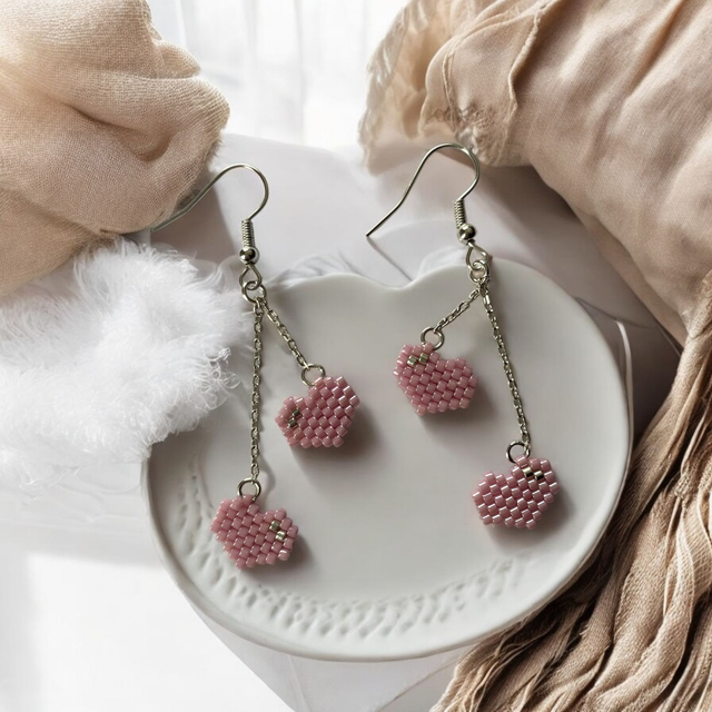 Boucles d&#039;oreilles duo de coeurs rose